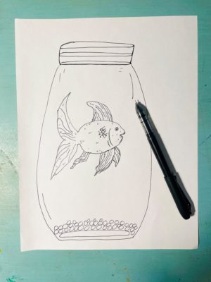 Drawing of a fish inside the jar.